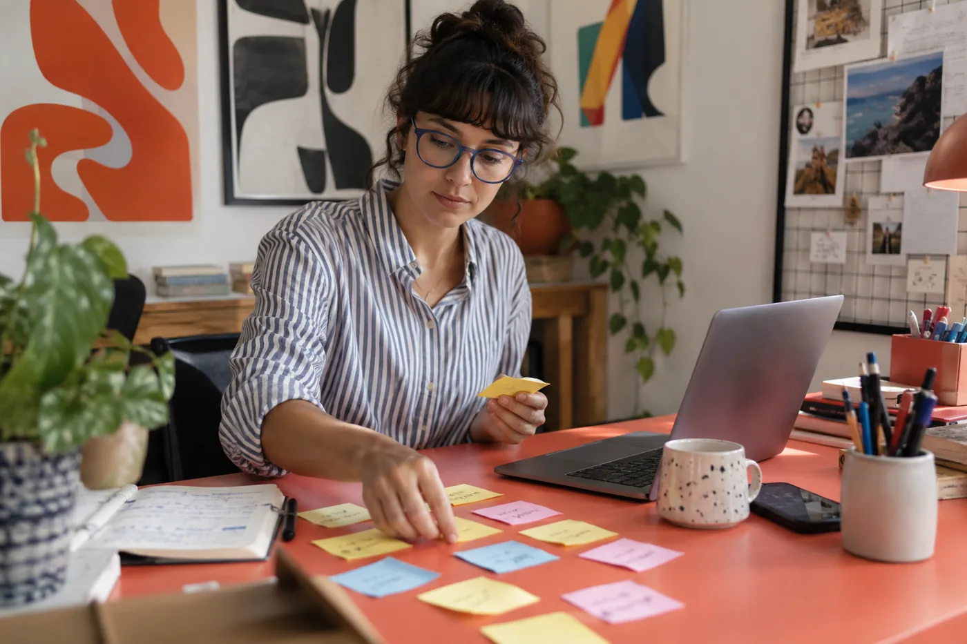 Illustrative scene: Creative professional arranging campaign tasks for an application time budget
